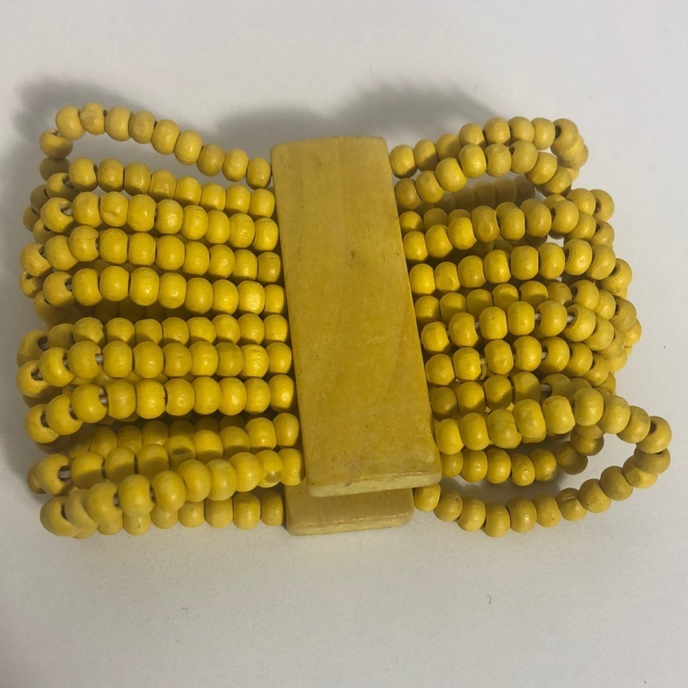 Bracelet made of wood beads  yellow
